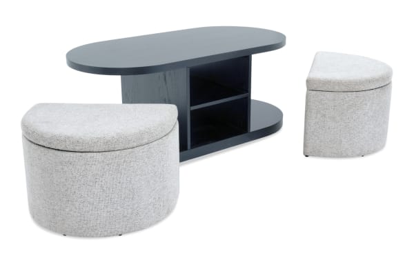 Hampton Entertainment & Occasional gray oval storage coffee table in MDF with two gray fabric polyester nesting footrests, contemporary style, hidden storage.