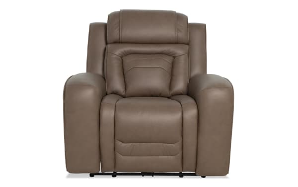 Brown leather recliner chair with padded armrests, cushioned backrest, and ergonomic design for living room comfort.