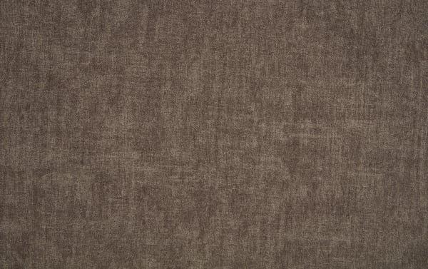 Brown textured fabric with a soft, velvety appearance, suitable for upholstery, curtains, or home decor applications.