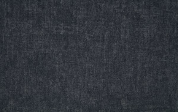 Dark gray textured fabric with a subtle woven pattern, suitable for upholstery, curtains, or interior design applications.