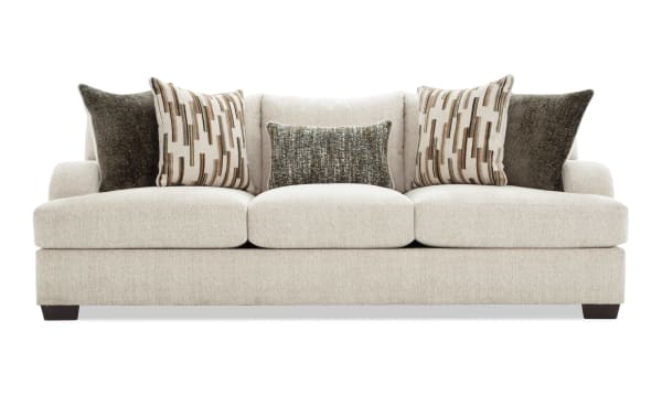 Cypress Beige 97'' transitional sofa with beige polyester fabric upholstery, plush memory foam cushions, and five decorative accent pillows for support and style.
