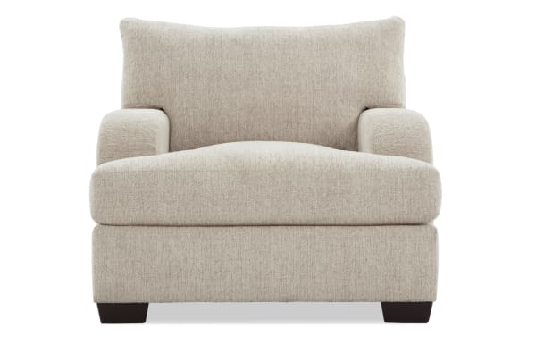 Beige Cypress Transitional Chair with plush polyester fabric upholstery, cozy Bob-O-Pedic® Memory Foam, and cushioned pillow for living room comfort.