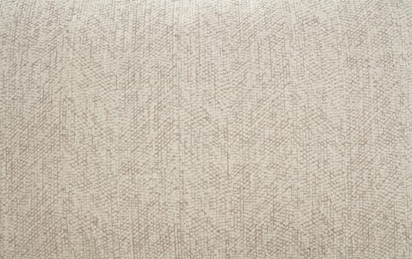 Beige textured fabric with a woven pattern, suitable for upholstery, curtains, or home decor applications.