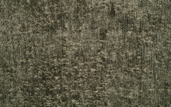 Close-up of a textured gray and beige carpet with a dense, looped pile pattern, suitable for home or office flooring.