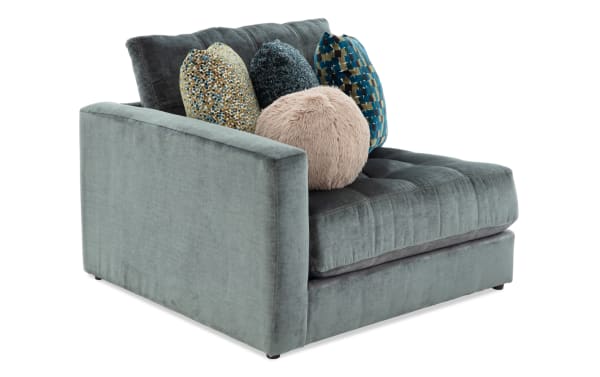 Emerald green Jewels Emerald Left Arm Facing Chair with plush polyester fabric, tufted seat, and assorted decorative accent pillows from Jewels glam collection.