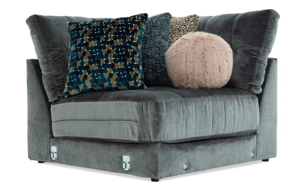 Emerald green Jewels Emerald Corner sectional sofa in glam style with plush polyester fabric, Bob-O-Pedic Gel Memory Foam cushions, and decorative accent pillows.