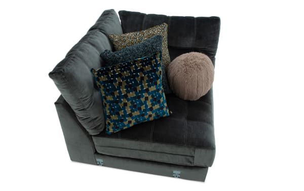 Emerald green Jewels Emerald Corner sectional in glam style with plush polyester fabric, Bob-O-Pedic Gel Memory Foam, and four decorative accent pillows.