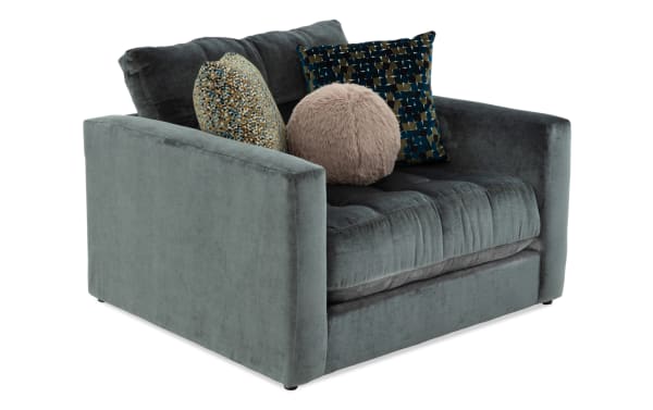 Emerald green Jewels Emerald Side Chair in glam style with plush polyester fabric, tufted seat, and three decorative accent pillows.