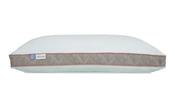 Adjustable pillow with a white top and bottom, gray patterned side panel, and tags labeled "&" and "ADJUSTABLE" for customizable comfort.