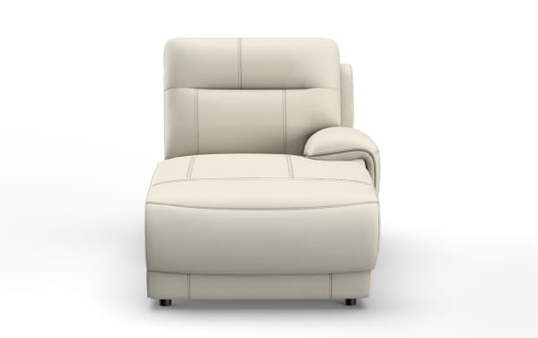 Modern beige leather armless lounge chair with cushioned backrest, single armrest on right side, and visible stitching details.