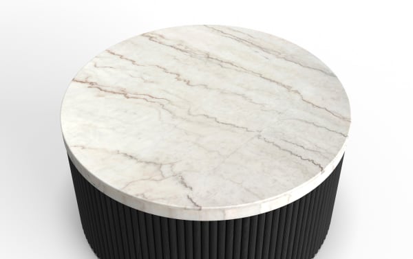 Round coffee table with a white marble top featuring natural gray and brown veining, supported by a black ribbed cylindrical base.