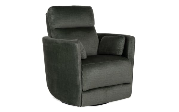 Dark green upholstered swivel recliner chair with padded armrests, cushioned backrest, and two matching accent pillows.