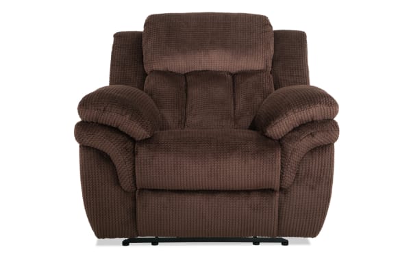Brown plush fabric recliner chair with padded armrests and cushioned backrest, designed for maximum comfort and relaxation.