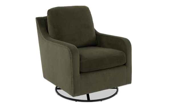 Olive green upholstered swivel armchair with plush cushions, rounded arms, and black metal circular base, ideal for modern living rooms.