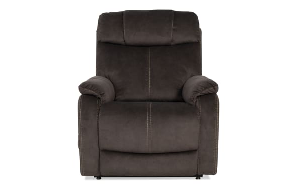Dark gray fabric recliner chair with padded armrests, cushioned backrest, and visible stitching, designed for living room comfort.
