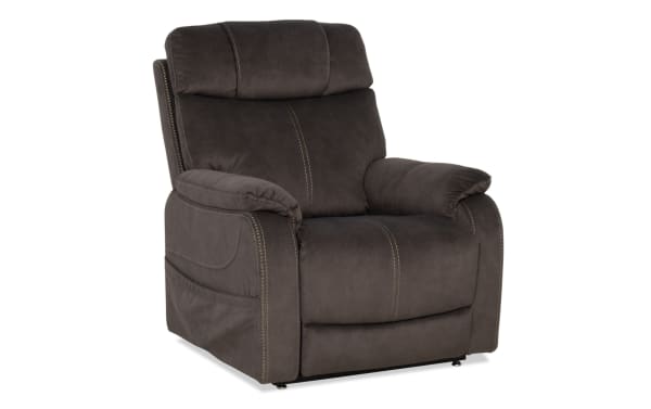 Dark gray microfiber recliner chair with plush padded armrests, cushioned backrest, and visible stitching, designed for living room comfort.