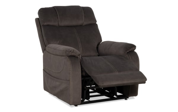 Dark gray fabric recliner chair with padded armrests, cushioned backrest, and extended footrest, designed for comfort and relaxation.