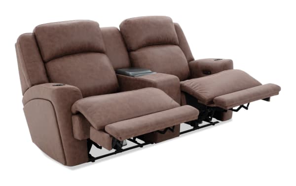 Brown leather reclining loveseat with padded armrests, built-in cup holders, and center console for storage, designed for home theater comfort.