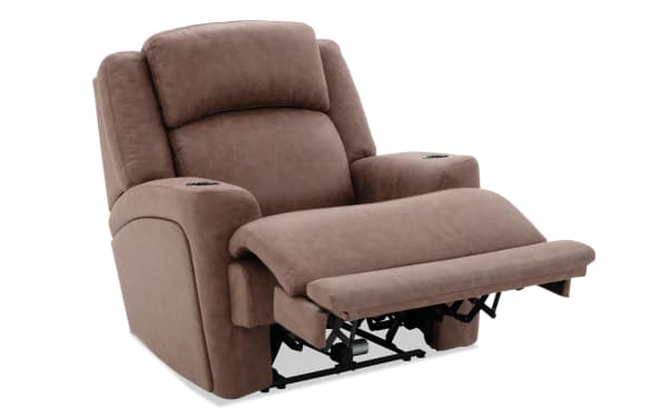 Brown leather reclining armchair with padded backrest, armrests, and extended footrest, featuring built-in cup holders for comfort and convenience.