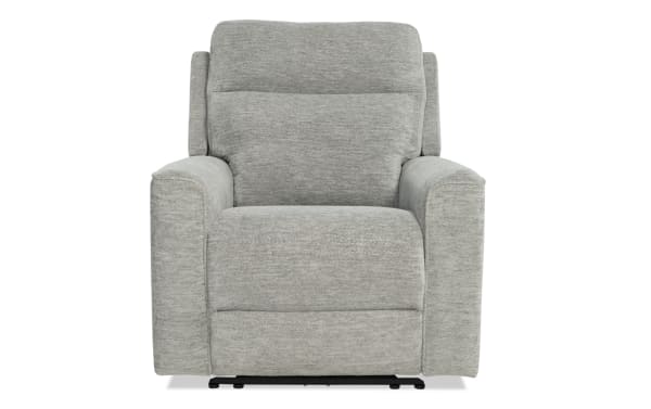 Gray fabric recliner chair with plush cushioning, wide armrests, and a modern design, ideal for living room comfort and relaxation.