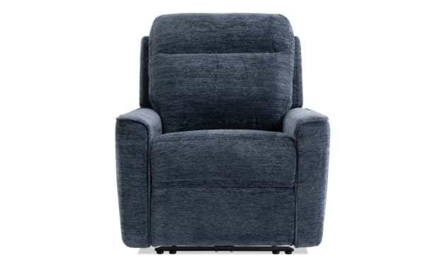 Dark blue plush fabric recliner chair with padded armrests and cushioned backrest, designed for comfort and relaxation.
