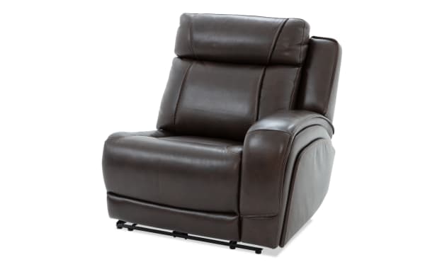 Dark brown leather recliner chair with cushioned backrest and armrest, featuring visible stitching and a modern, plush design for living room comfort.