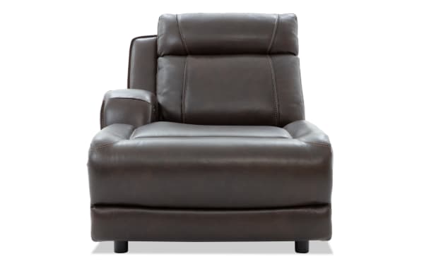 Dark brown leather recliner chair with padded armrest and cushioned backrest, designed for comfort and modern living room seating.