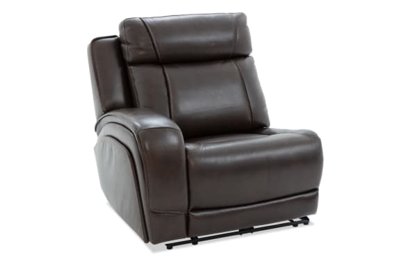 Dark brown leather recliner chair with padded armrests and cushioned backrest, designed for comfort and modern living rooms.