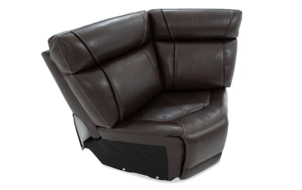 Dark brown leather corner recliner sofa section with plush cushions and visible stitching, designed for comfortable living room seating.