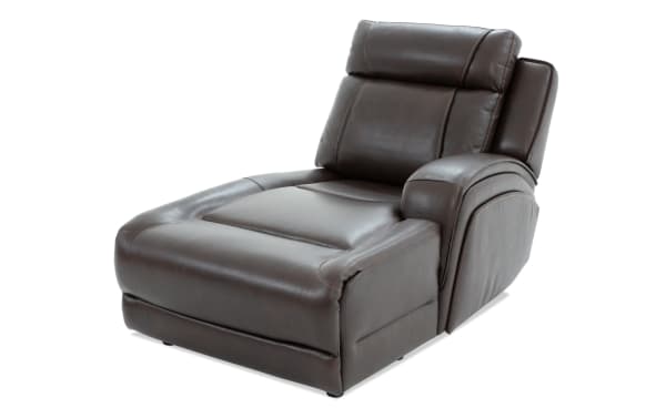 Dark brown leather recliner chair with padded armrest and cushioned backrest, designed for comfort and modern living rooms.