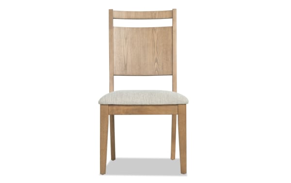 Wooden dining chair with a light beige cushioned seat, straight legs, and a slatted backrest in natural wood finish.
