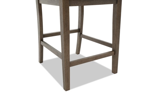 Wooden chair legs and support bars in a dark brown finish, showcasing sturdy construction and a classic design suitable for dining or bar stools.