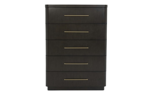 Dark wood five-drawer chest with rounded edges and sleek brass handles, featuring a modern minimalist design for bedroom storage.