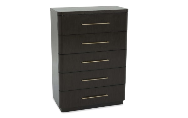Dark wood five-drawer dresser with rounded edges and sleek brass handles, suitable for modern bedroom storage.
