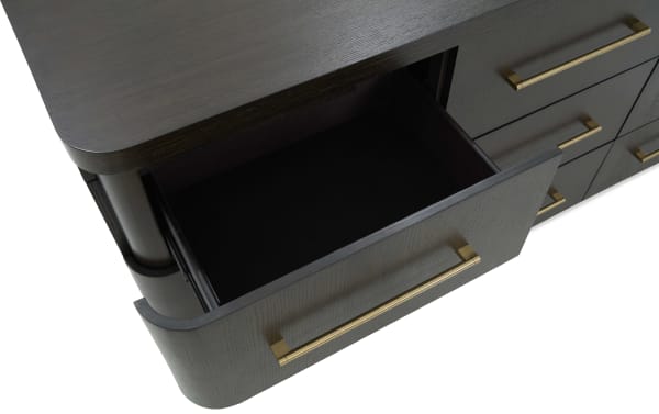 Contemporary Luxe Brown 9 Drawer Dresser in dark wood with rubberwood frame, oak veneer, brass handles, and soft-close drawers, one open.
