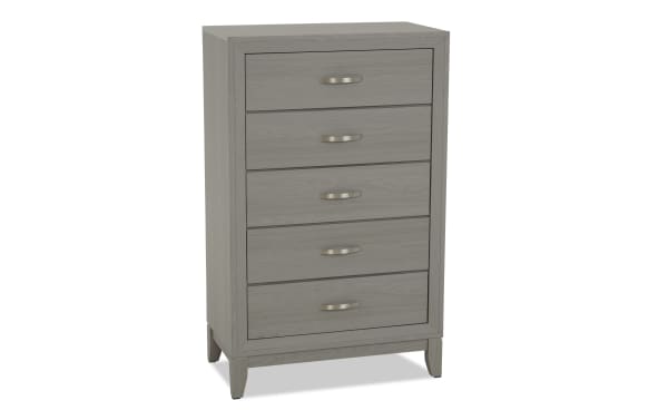 Trinity Gray 5 Drawer Chest in transitional style, made from durable rubberwood with smooth-gliding drawers and felt-lined top drawer for bedroom storage.