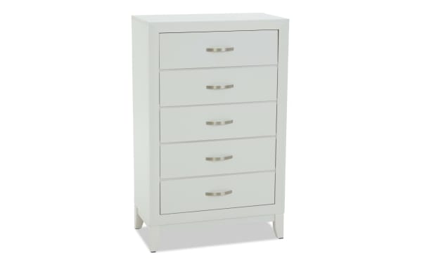 White wooden chest of drawers with five spacious drawers, modern silver handles, and a sleek, minimalist design for bedroom storage.