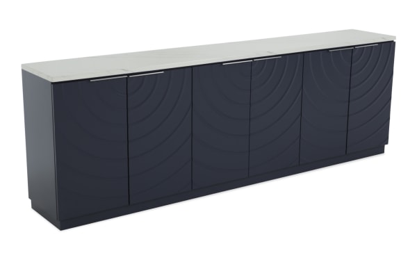 Modern navy blue sideboard cabinet with a white marble top, featuring four doors with subtle circular patterns and slim metal handles.