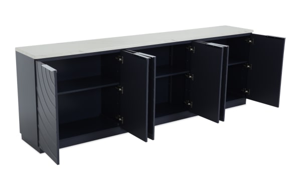 Modern black wooden sideboard with four open doors, two shelves inside each compartment, and a white marble top, ideal for living room storage.