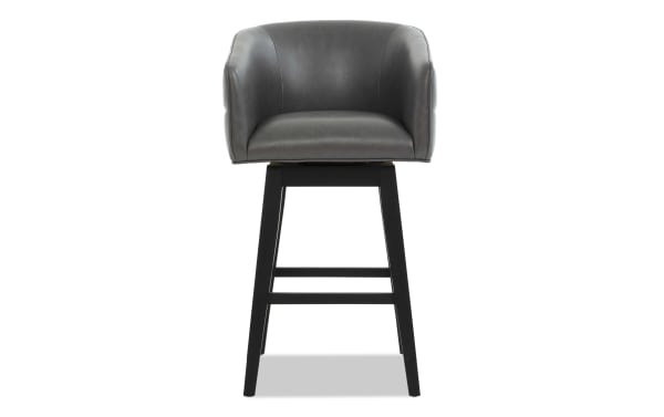 Gray leather swivel bar stool with cushioned seat and backrest, black wooden legs, modern design for kitchen or bar seating.