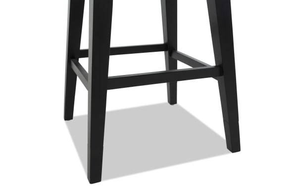 Black wooden stool legs with square tapered design and horizontal support bars, showcasing sturdy construction and modern style.