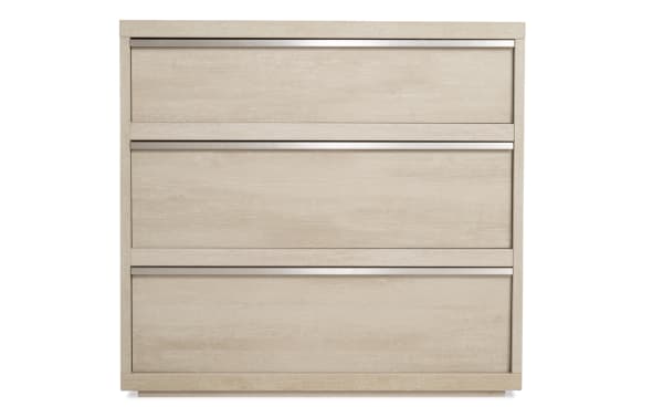 Delray White 3 Drawer Chest in MDF with a light wood finish, featuring contemporary clean lines and soft-close drawers for smooth, practical bedroom storage.
