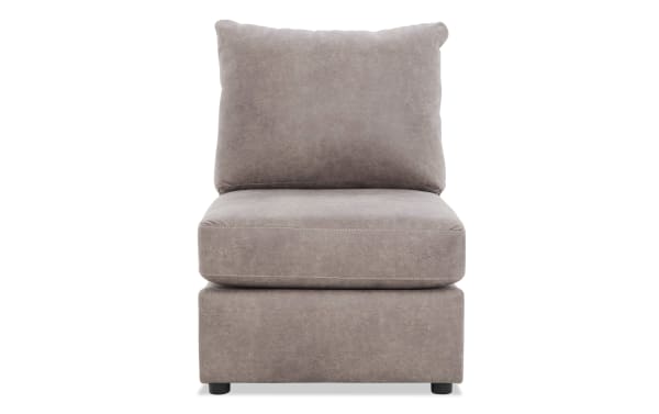 Armless accent chair with taupe microfiber upholstery, plush cushions, and low-profile black legs, ideal for modern living spaces.