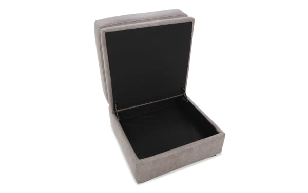 Upholstered storage ottoman in beige fabric with a hinged lid open to reveal a spacious black-lined interior for organizing items.
