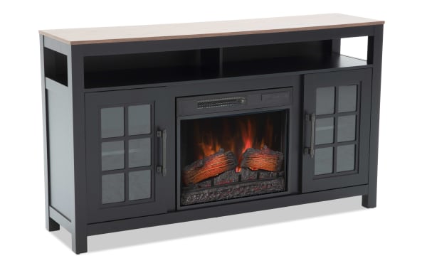 Black electric fireplace TV stand with wood top, glass-paneled cabinet doors, open shelf, and realistic flame effect logs.