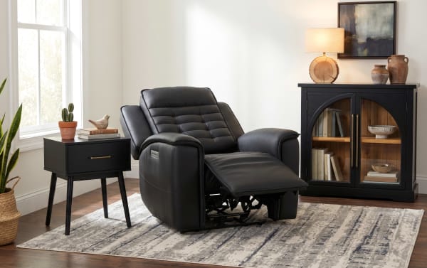 Raptor Black Power Recliner with Power Headrest in black leather, contemporary style with memory foam cushioning, USB ports, and full recline function.