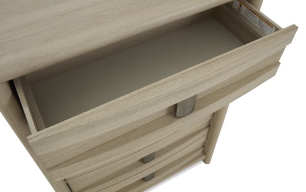 Light wood dresser drawer open, showing spacious interior and modern metal handle, highlighting natural wood grain texture and minimalist design.
