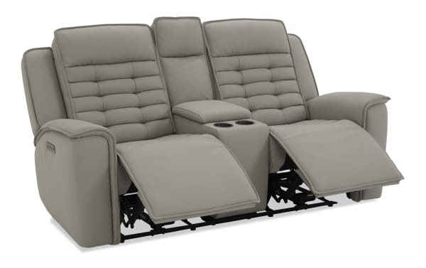 Gray leather dual reclining loveseat with padded armrests, center console with storage and cup holders, and stitched back cushions.