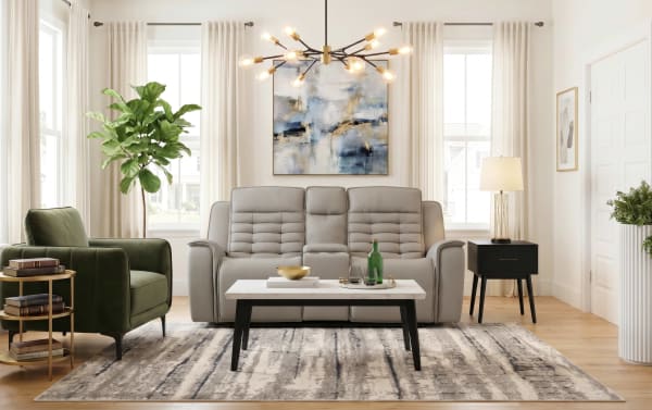 Contemporary Raptor Gray Leather 77'' power reclining console loveseat with power headrest, lumbar support, built-in cup holders, USB ports, and hidden storage.
