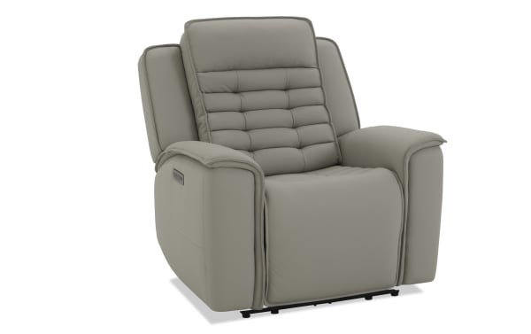 Modern gray leather recliner chair with padded backrest, cushioned armrests, and built-in side control panel for adjustable comfort.